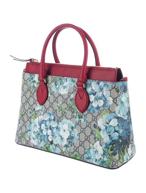 gucci blooms supreme tote|Gucci Bloom pouch.